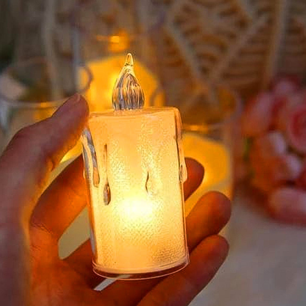 Hand holding a smokeless, odourless LED candle, perfect for safe home decor.