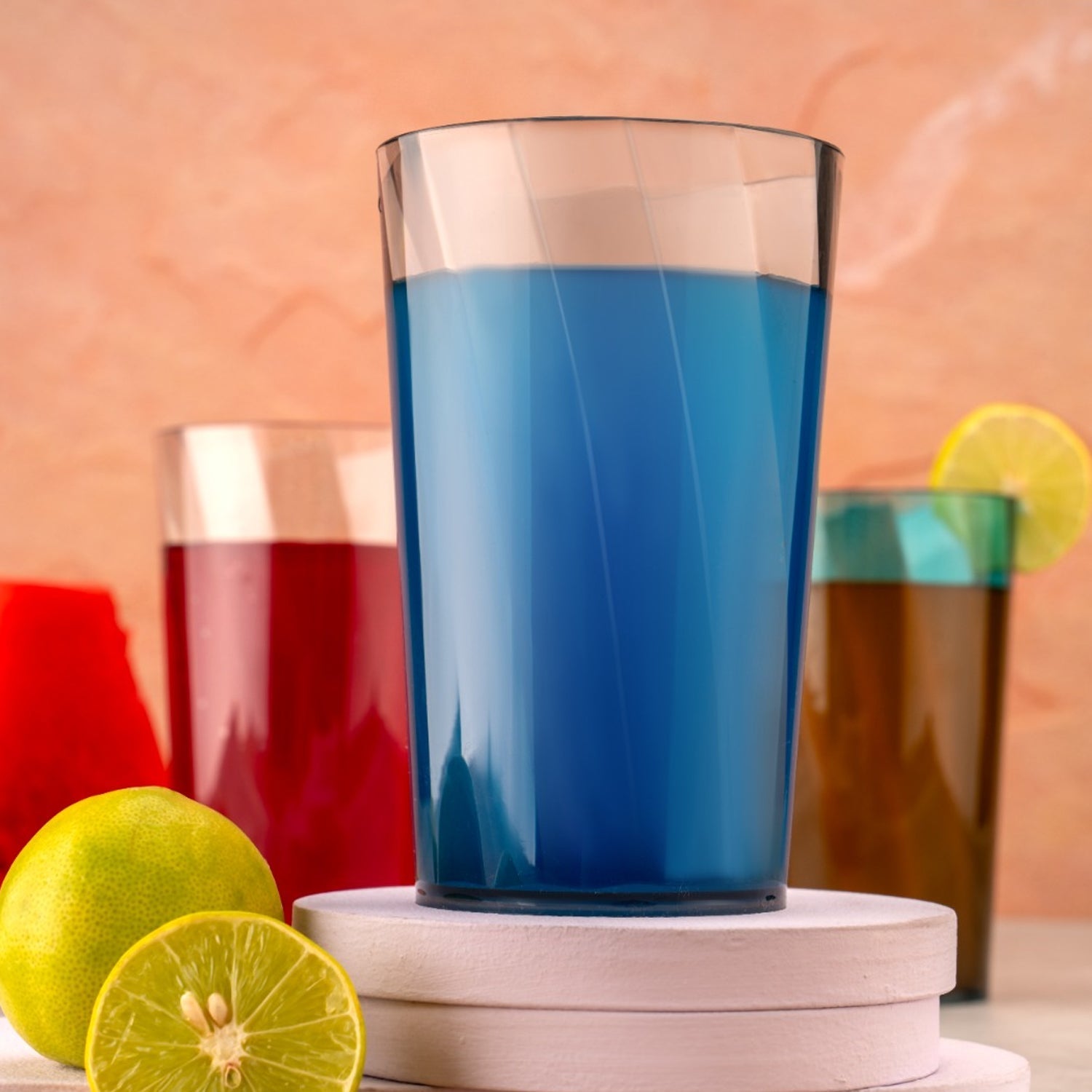Six transparent cocktail glasses arranged neatly.