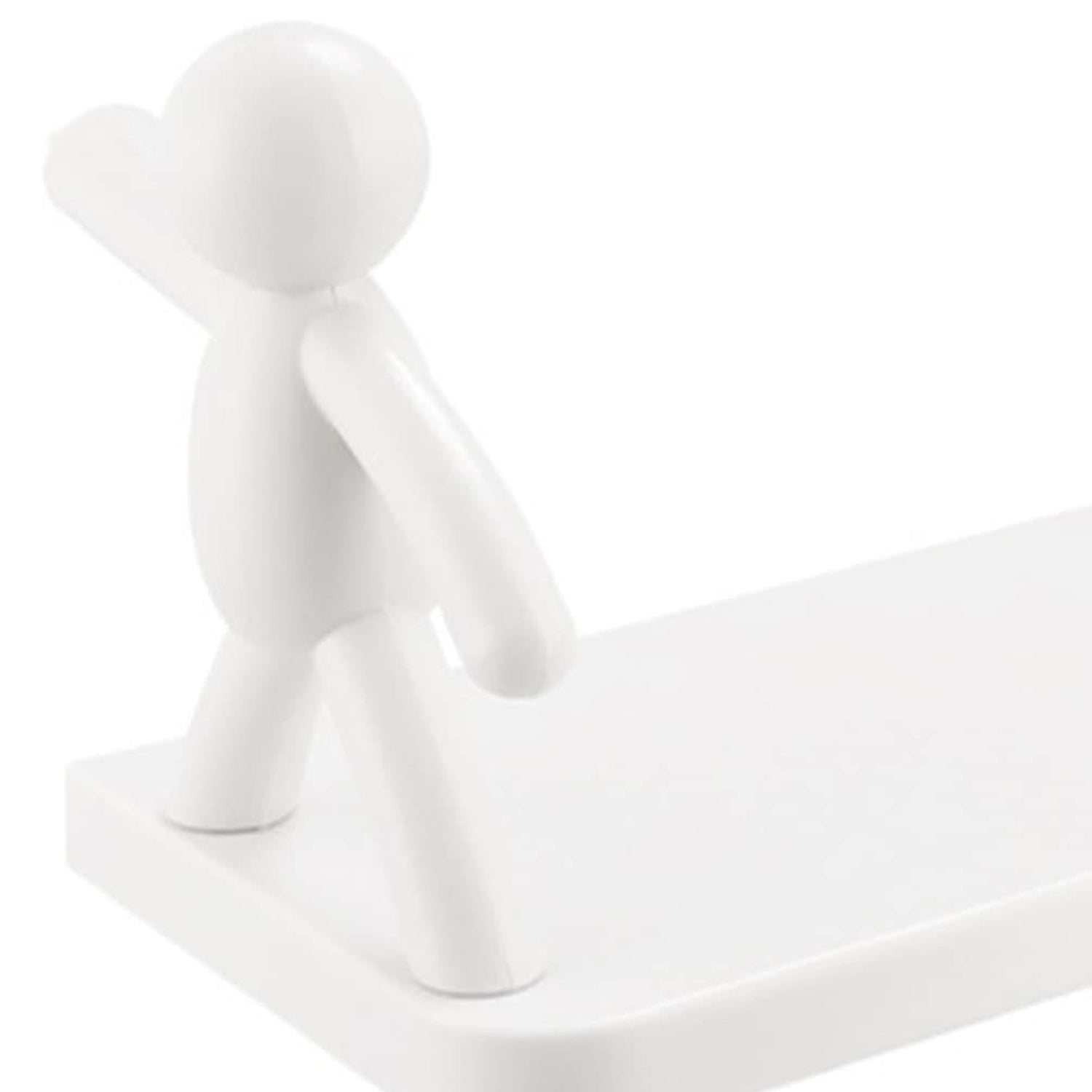 Decorative wall-mounted shelf featuring a human figurine for creative display.