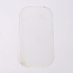 Clear anti-slip dashboard mat blending with vehicle interior