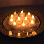 LED floating candles arranged on water surface enhancing home décor ambiance