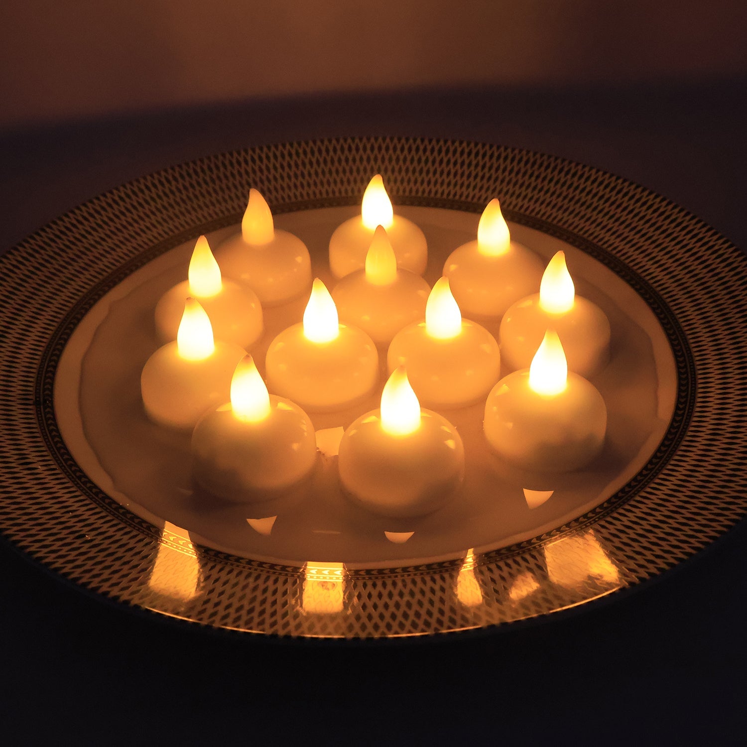 LED floating candles arranged on water surface enhancing home décor ambiance