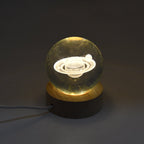 The astronaut 3D crystal lamp glowing softly, creating an ambient atmosphere.