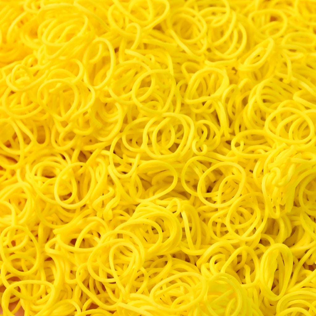 Elastic rubber bands laid out on surface showcasing durability