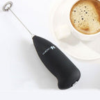Lifestyle shot of the XcelCraft hand blender being used to prepare a healthy smoothie.