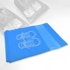Waterproof beach bag placed on a lounge chair, ready for seaside adventures and gear protection.