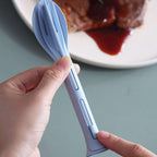 An individual piece from the portable cutlery set, highlighting its ergonomic design and smooth finish.
