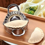 Stainless steel dumpling maker with a perfectly sealed dumpling.
