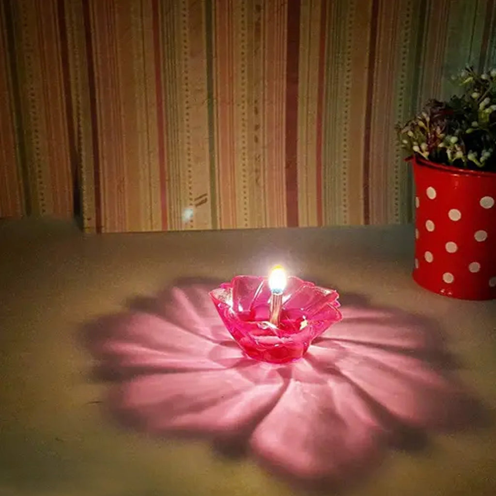 Packaging for the 12-piece multicolor plastic Diwali Diya Set.