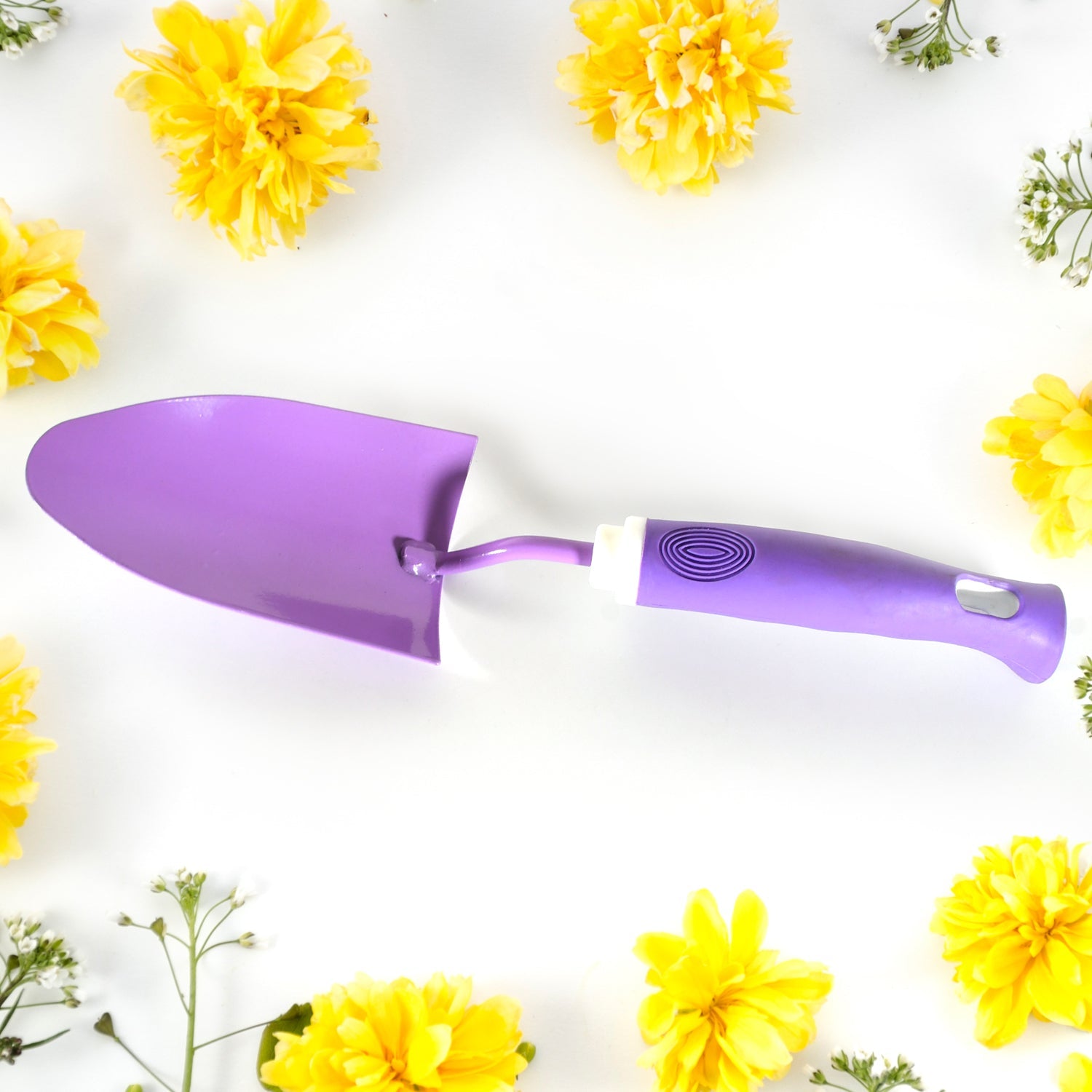 Weeder tool effectively removing unwanted plants from garden beds.