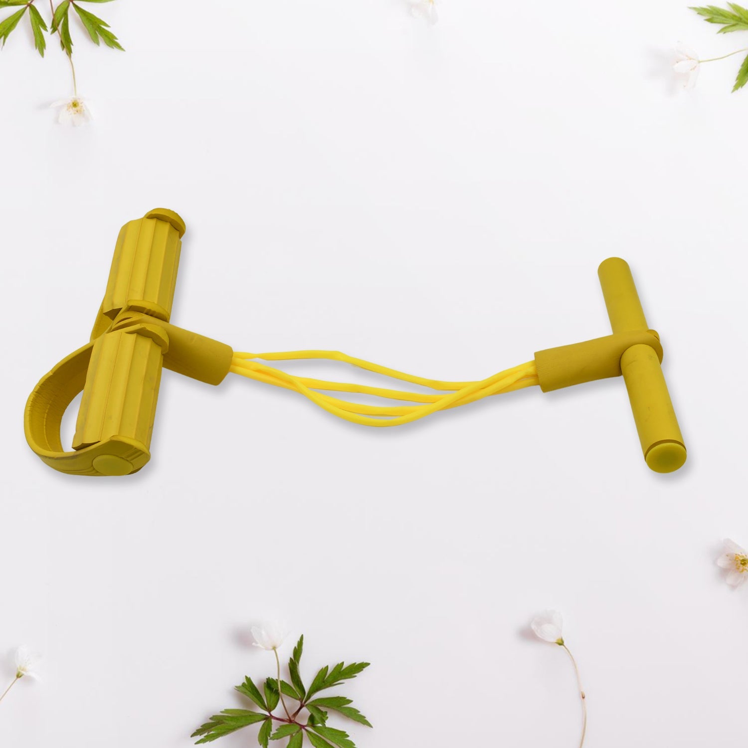 A woman demonstrating leg exercises using the versatile Pull Rope Exerciser.
