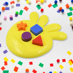 The unique octagonal base of the Octo Shape Sorter Toy filled with colorful, sorted shapes.