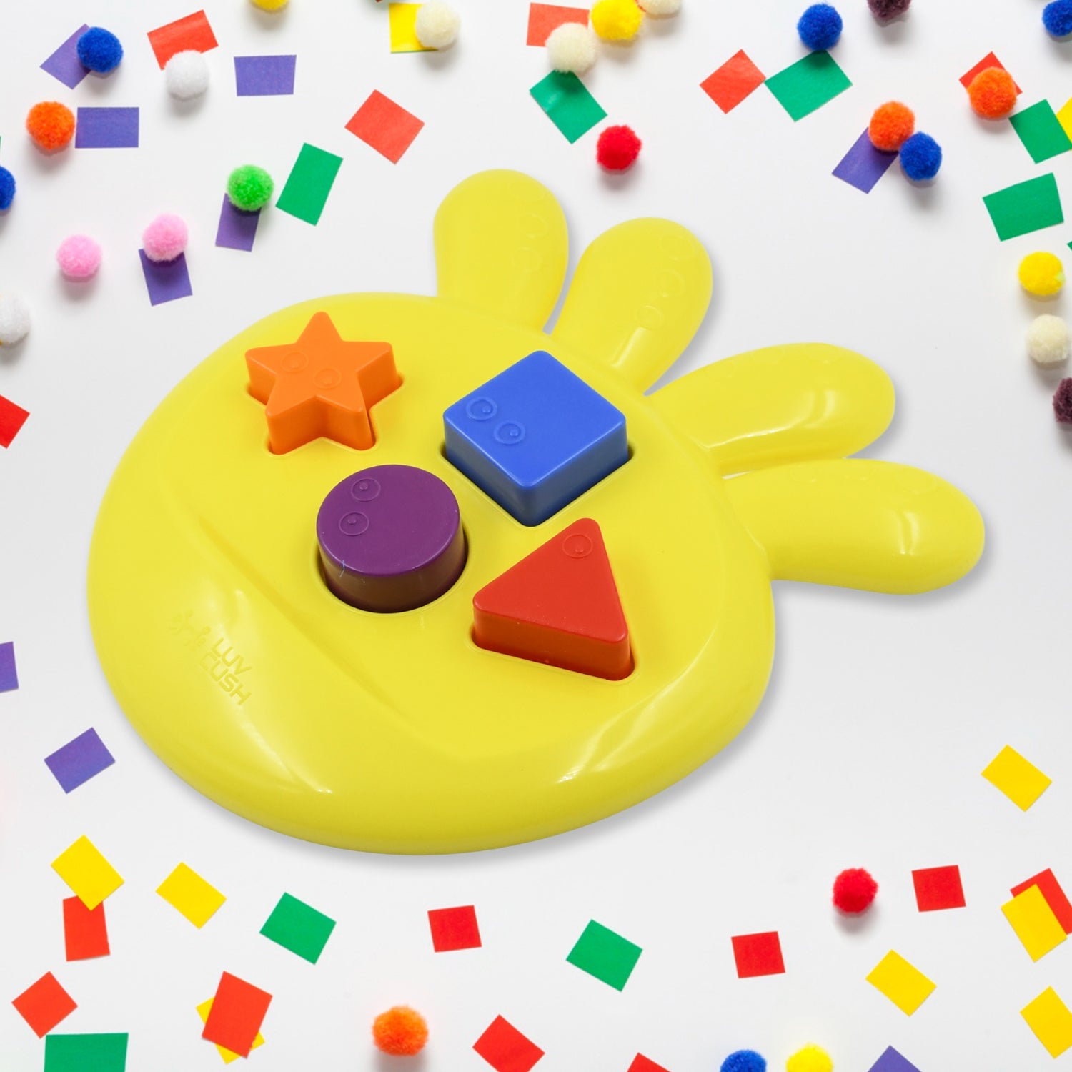 The unique octagonal base of the Octo Shape Sorter Toy filled with colorful, sorted shapes.