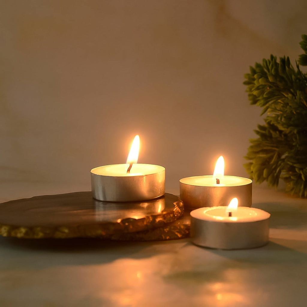 Smokeless tealight candles illuminating a festive setting for Diwali.