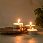 Smokeless tealight candles illuminating a festive setting for Diwali.