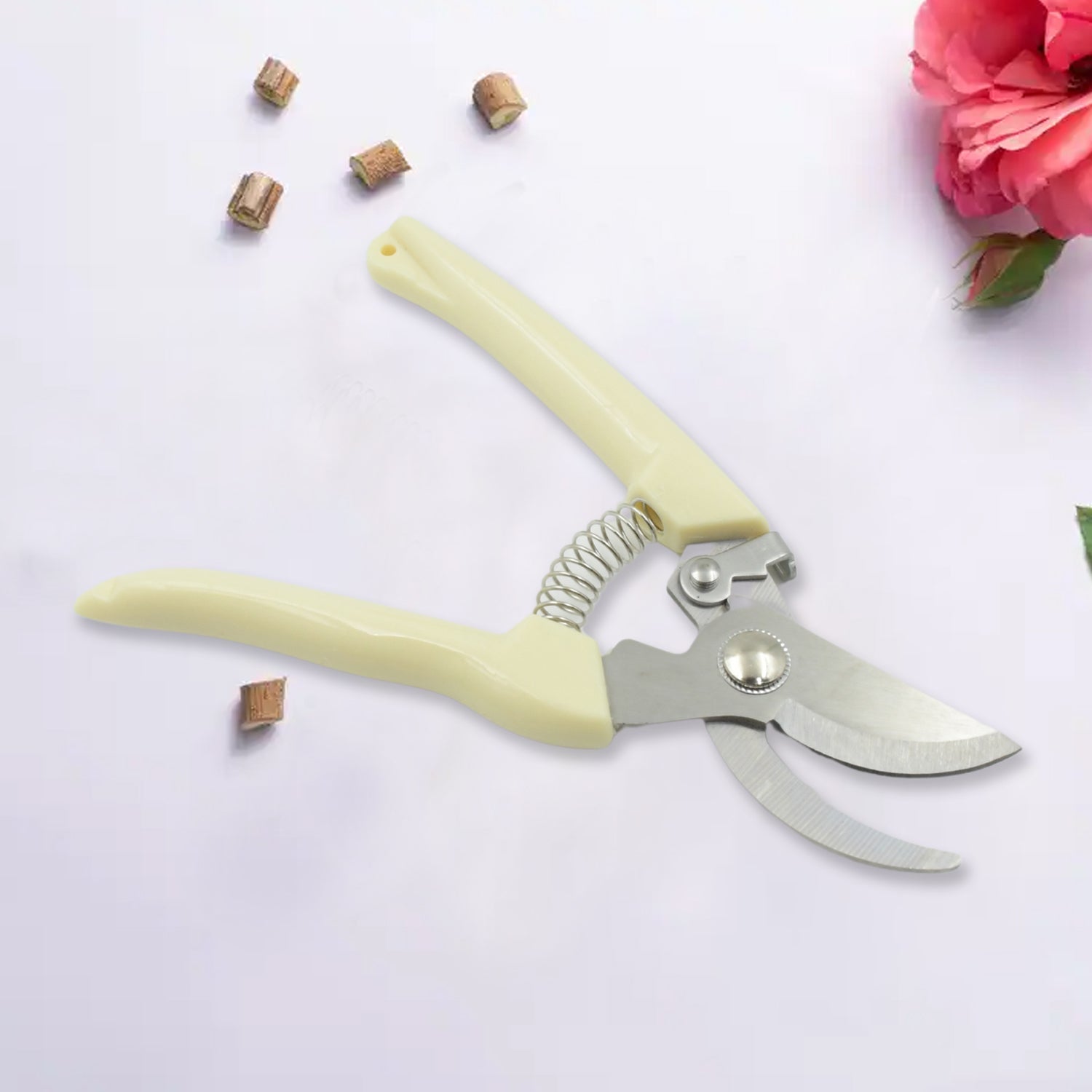 Stainless steel pruning shears from a side view, highlighting the design.