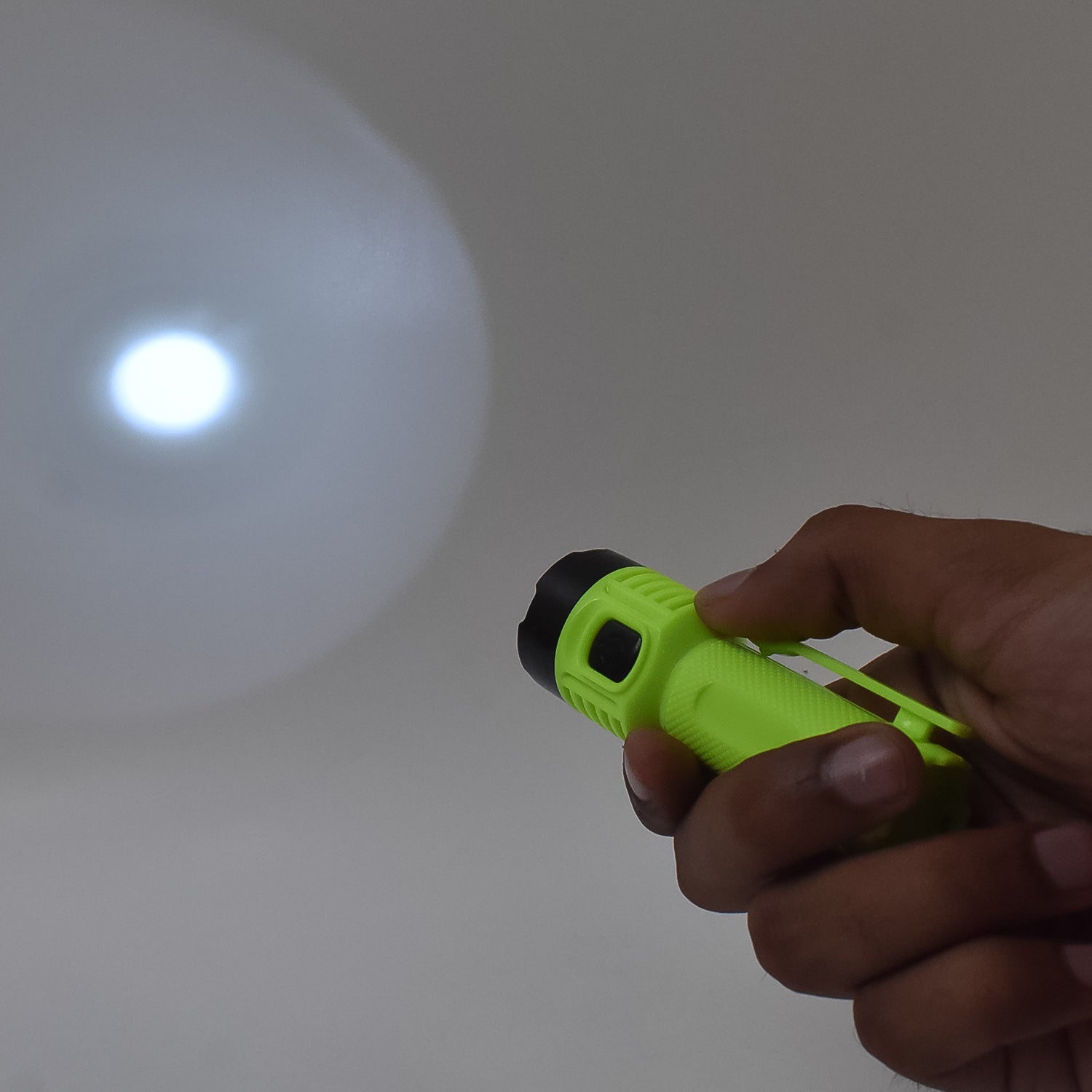 Close-up image of USB charging port on LED flashlight torch
