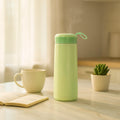 Leak-proof green plastic flask with carry strap and 400ML capacity