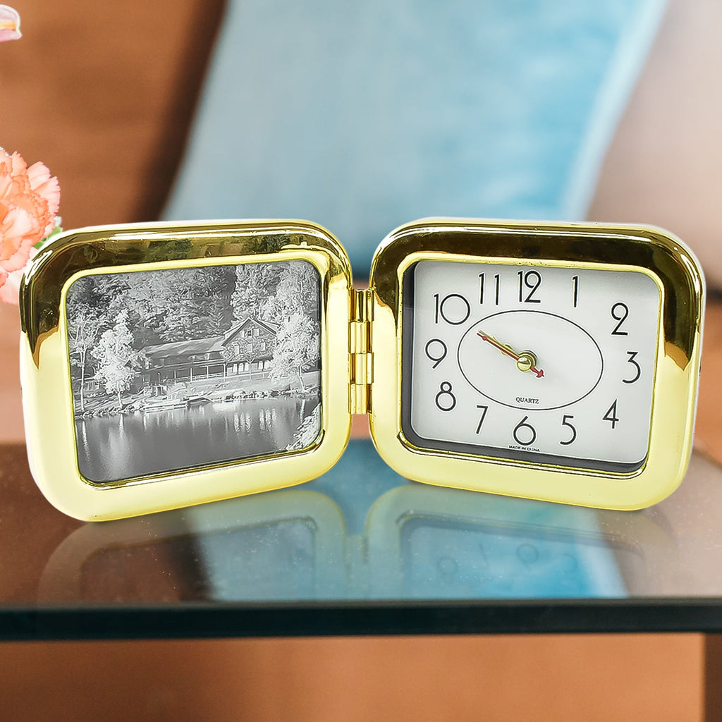 Foldable desk clock placed on a suitcase showcasing travel convenience