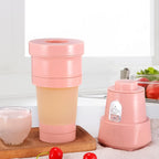 USB rechargeable portable blender actively mixing fruit for a fresh smoothie.