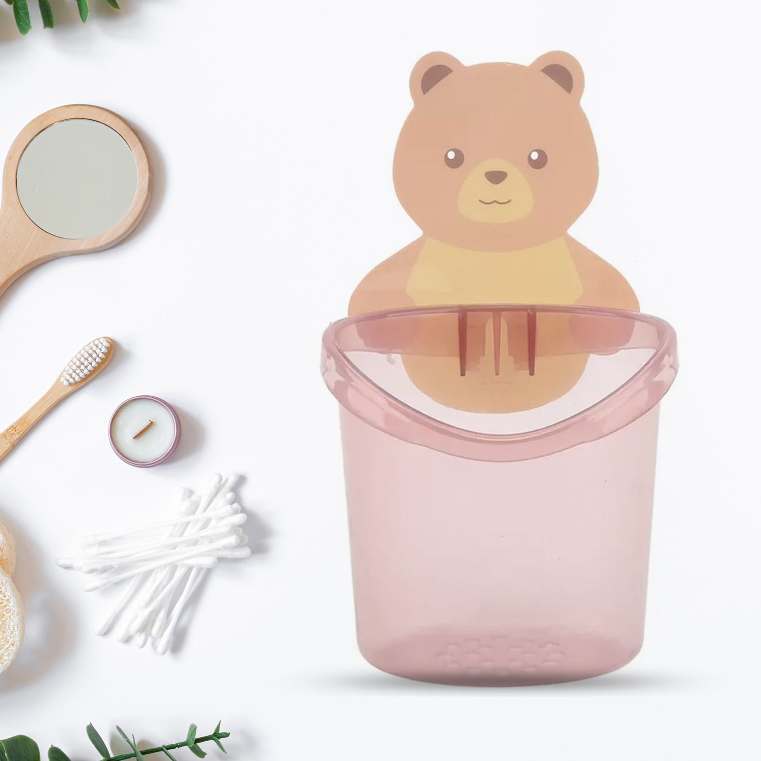 Cute teddy bear toothbrush holder with self-adhesive backing for a kid's bathroom.