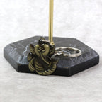 Side view of Ganesh Face Antique Black Metal Keychain displaying metal craftsmanship