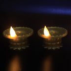 Water sensor LED diya showing golden finish and light sensor mechanism