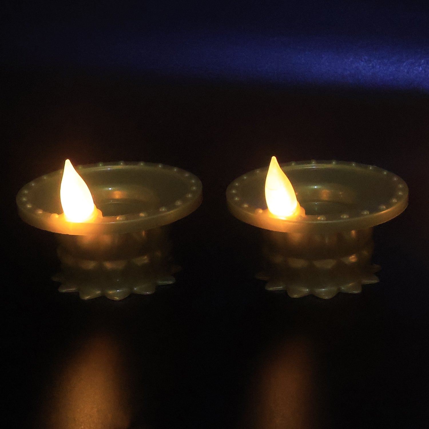Water sensor LED diya showing golden finish and light sensor mechanism