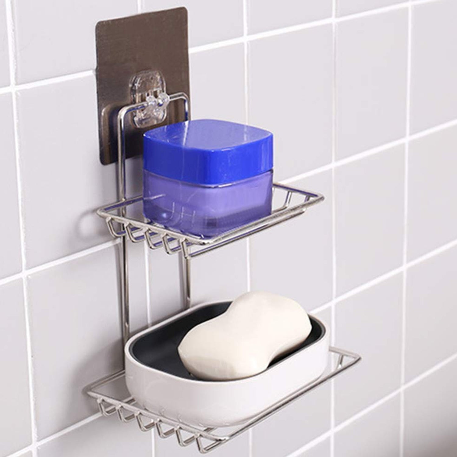 Components of the self-adhesive wall mounted soap dish: stainless steel tray and sticker.