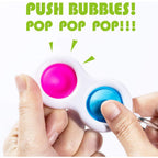 Portable Simple Dimple Fidget Toy Keychain, ideal for anxiety relief.