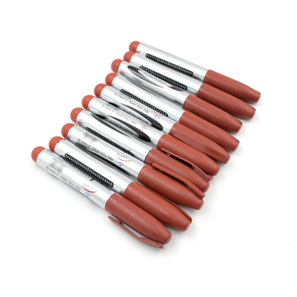 Maroon permanent marker held in hand, demonstrating its comfortable grip.