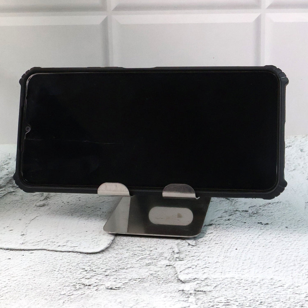 Generic image showing mobile and tablet stand holder in use