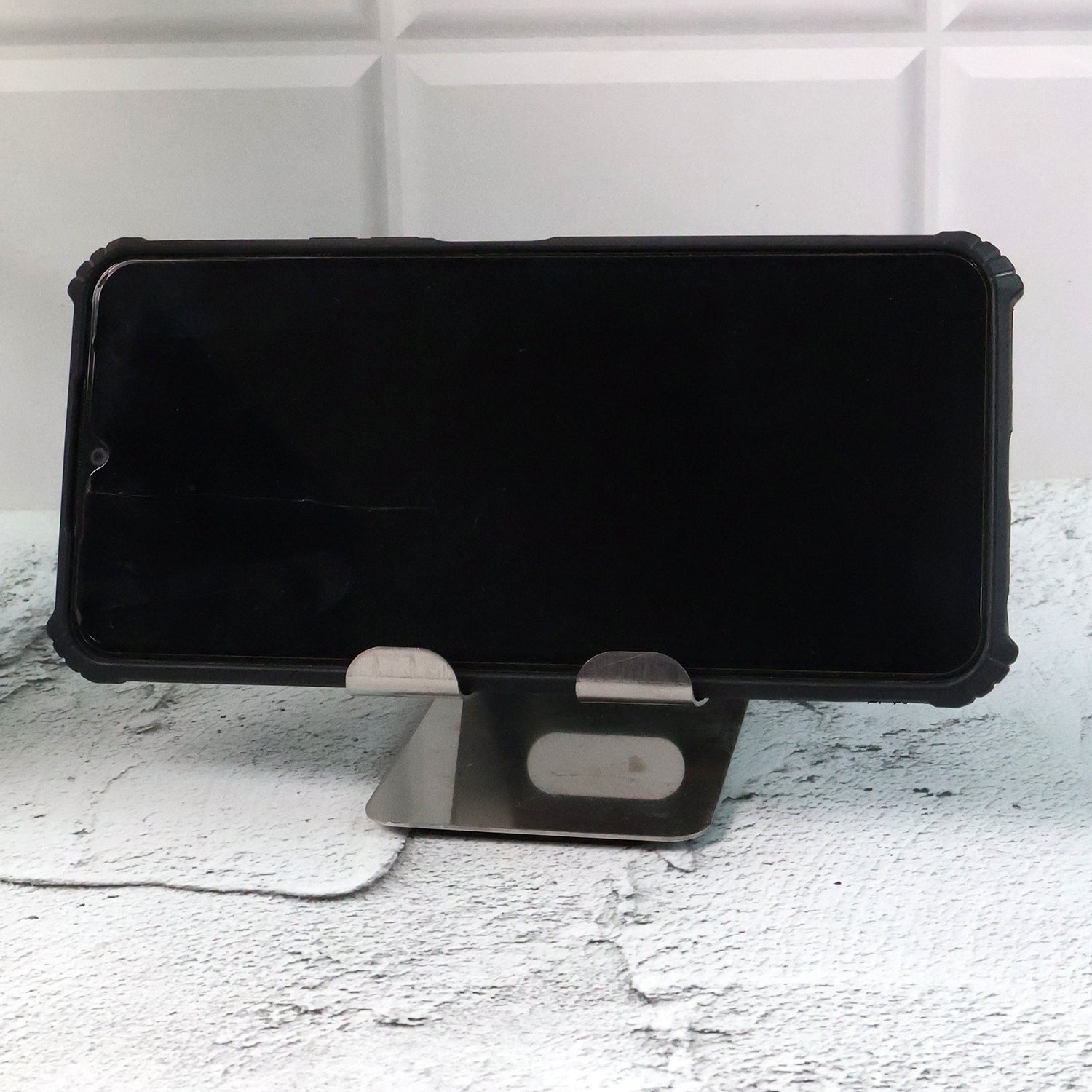Generic image showing mobile and tablet stand holder in use