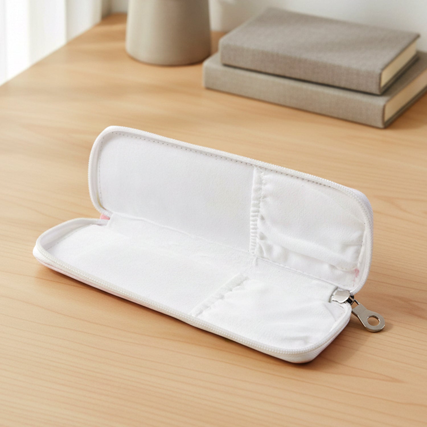 Hand holding portable zip closure makeup brush pouch