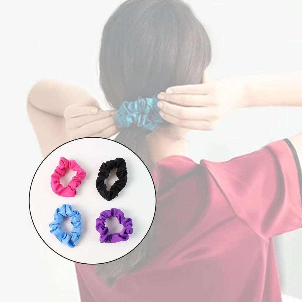 Four soft elastic hair scrunchies displayed together, showcasing the gentle fabric and robust elastic.