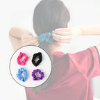 Four soft elastic hair scrunchies displayed together, showcasing the gentle fabric and robust elastic.
