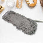 Person using the Pro Clean Wet & Dry Floor Mop to clean a large floor area.