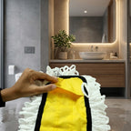Efficiently cleaning a tiled floor with the durable cotton mop refill.