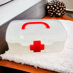 Close-up of the clear lid and internal compartments of the sturdy medicine storage box.