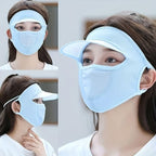 Woman wearing a grey UV Protection Cap with built-in mask and wide brim visor.