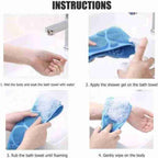 Dual-sided silicone back scrubber with different textures for varied exfoliation.
