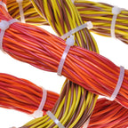 Detailed view of a single black 10-inch self-locking wire tie, showcasing its durable mechanism.