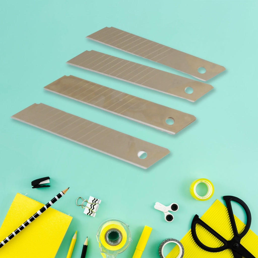 Close-up of the sharp, snap-off utility knife blades for precise cutting.