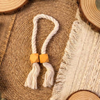Stylish magnetic curtain holder showcasing its braided rope design.