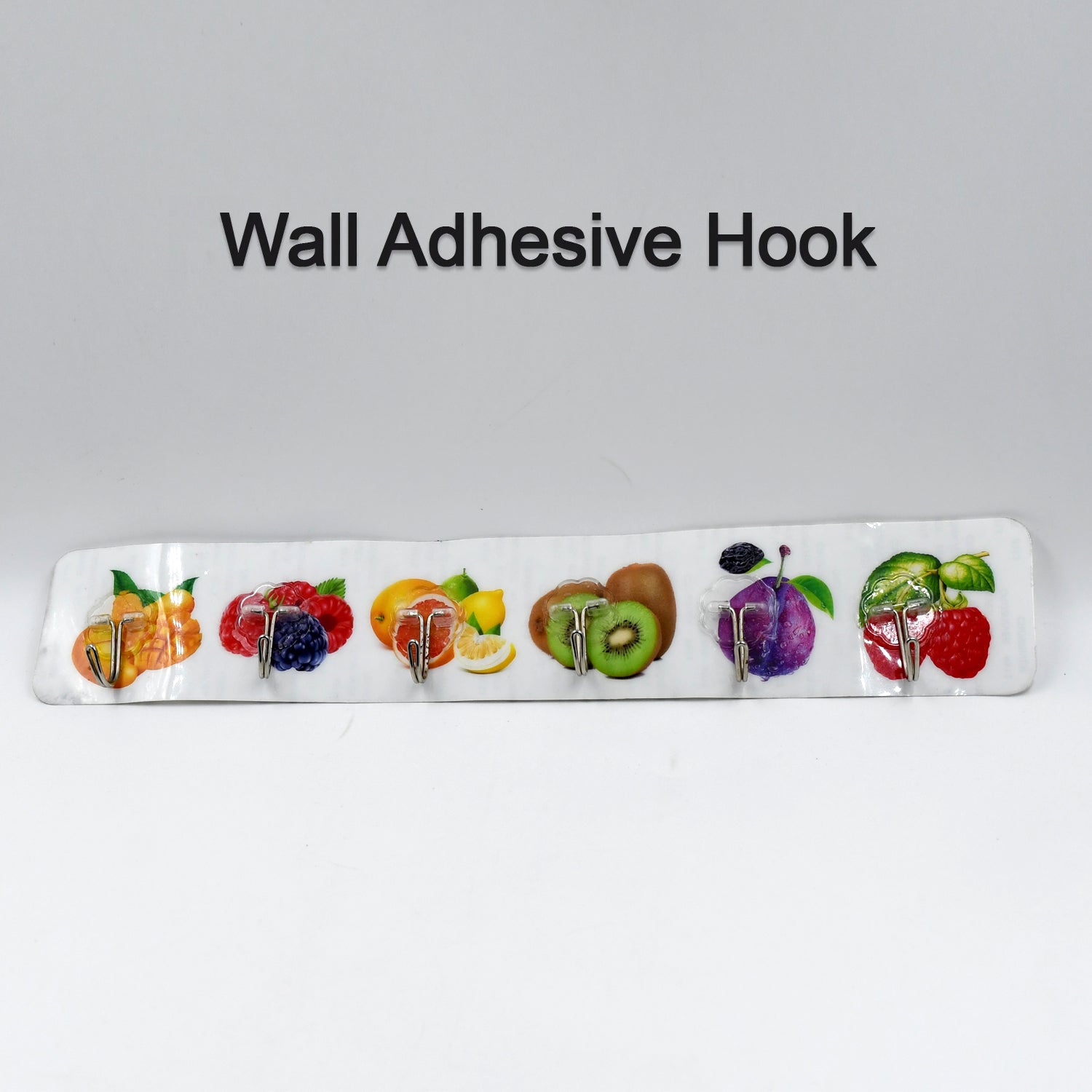 Versatile transparent adhesive hook holding kitchen utensils on a wall.