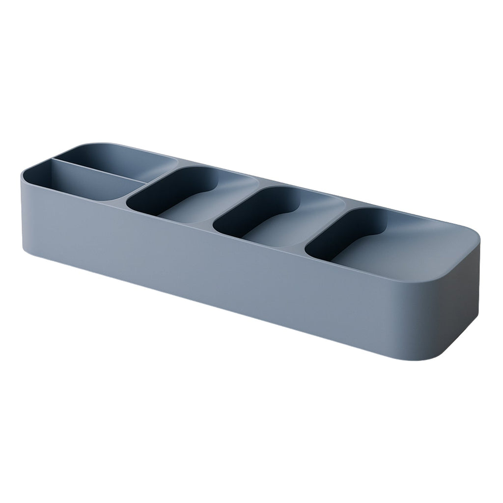 Detailed view of the innovative stacked compartments within the plastic cutlery tray.