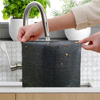 Thickened microfiber cleaning cloth wiping kitchen counter for spotless results
