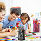 Compact metal mesh pen holder holding stationery, enhancing desk organization.
