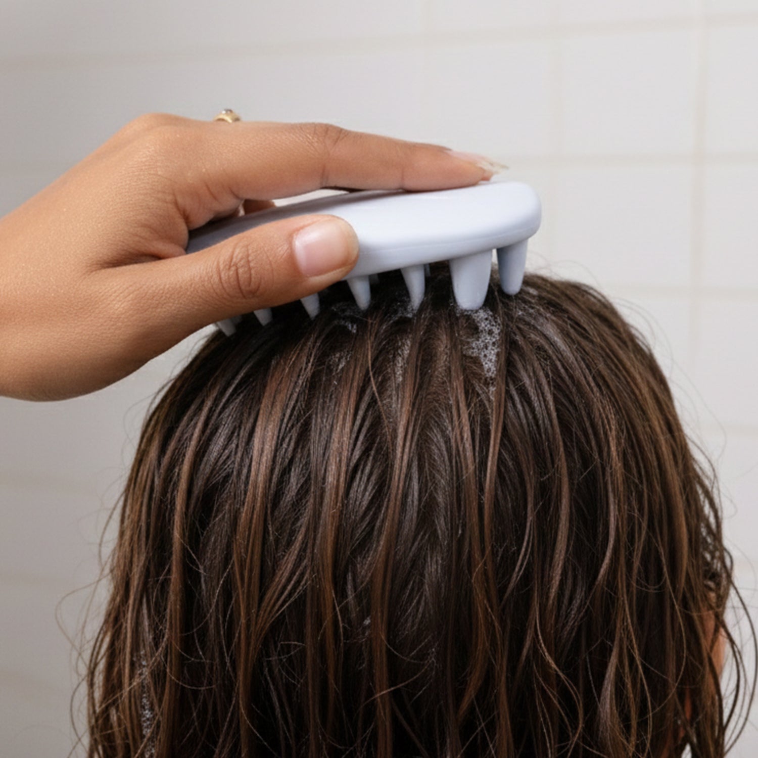 Hair washing scalp massage brush designed for effective scalp cleansing