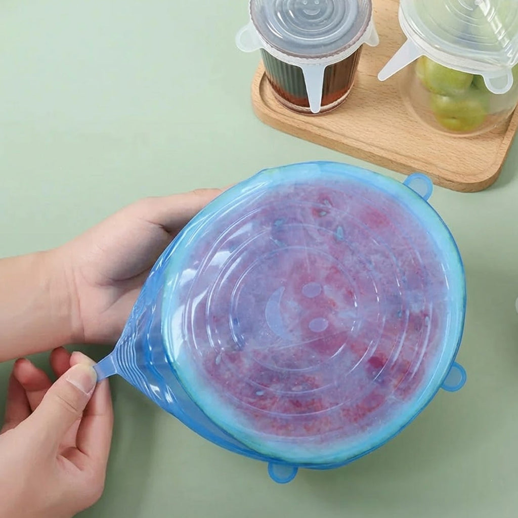 Reusable silicone lids creating airtight seals on food bowls